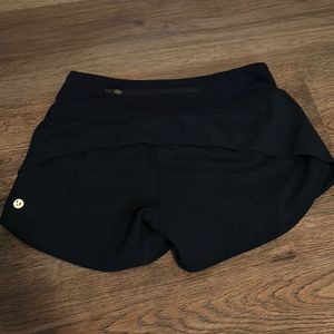 Navy Lululemon size 4, 4 inch speed up shorts!